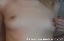 Blonde cutie rubs a cherry on her tit